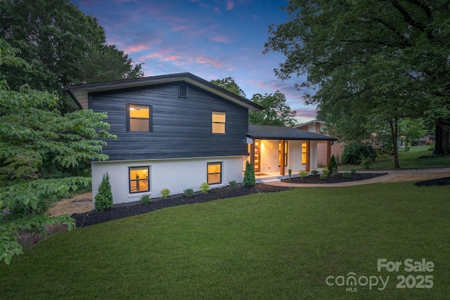 3326 Winterfield Pl, Charlotte, NC 28205 - tri-level home with a yard and a porch