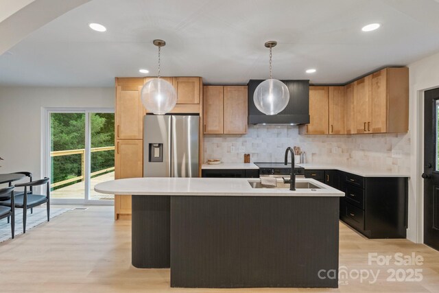 3326 Winterfield Pl, Charlotte, NC 28205 - kitchen featuring stainless steel refrigerator with ice dispenser, light wood-style flooring, light countertops, decorative backsplash, and recessed lighting