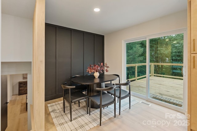 3326 Winterfield Pl, Charlotte, NC 28205 - dining area featuring light wood finished floors and recessed lighting