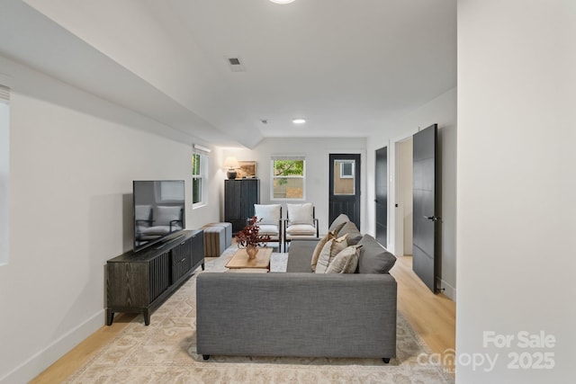 3326 Winterfield Pl, Charlotte, NC 28205 - living room with light wood-style floors, baseboards, and recessed lighting