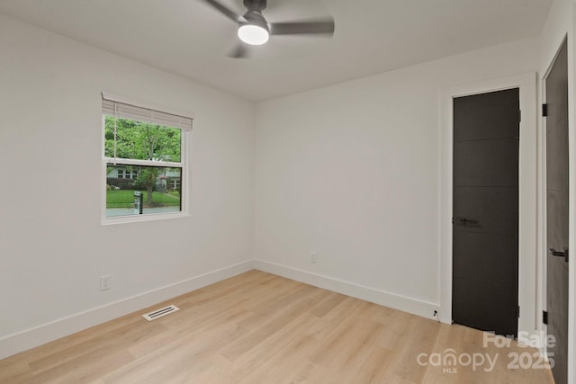 3326 Winterfield Pl, Charlotte, NC 28205 - empty room with light wood-style flooring and ceiling fan