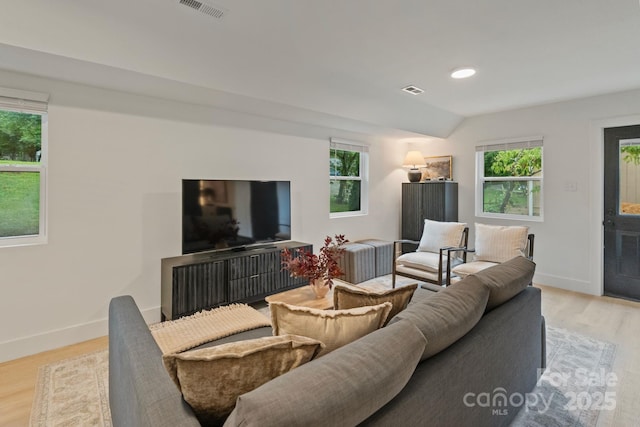 3326 Winterfield Pl, Charlotte, NC 28205 - living area with light wood-style floors and plenty of natural light