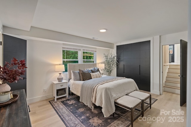 3326 Winterfield Pl, Charlotte, NC 28205 - bedroom featuring light wood finished floors and baseboards