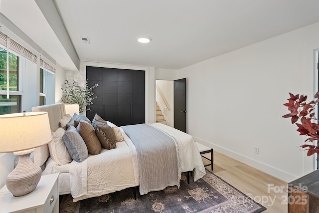 3326 Winterfield Pl, Charlotte, NC 28205 - bedroom featuring wood finished floors and baseboards