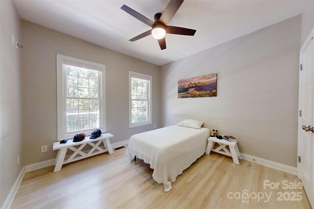 118 Tayport Dr, Troutman, NC 28166 - bedroom featuring light wood finished floors, baseboards, and ceiling fan