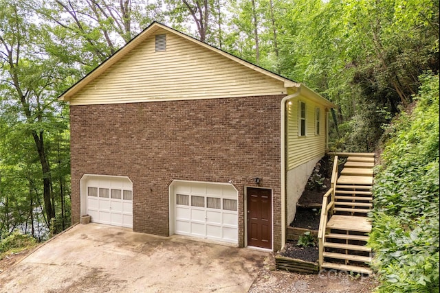 608 Surrey Glen Cir, Hendersonville, NC 28739 - view of side of property with stairs and brick siding