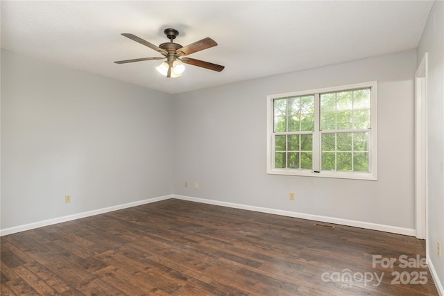 608 Surrey Glen Cir, Hendersonville, NC 28739 - spare room with dark wood-style floors, baseboards, and a ceiling fan