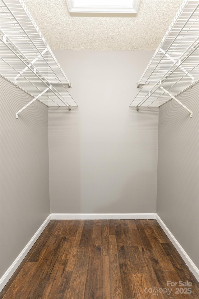 608 Surrey Glen Cir, Hendersonville, NC 28739 - walk in closet with wood finished floors