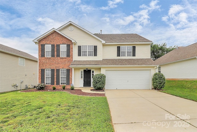 720 Reigate Rd, Charlotte, NC 28262 - traditional-style home featuring brick siding, a garage, concrete driveway, and a front yard