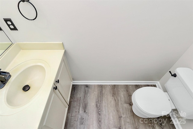 720 Reigate Rd, Charlotte, NC 28262 - bathroom featuring wood finished floors and vanity