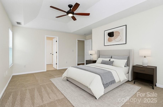 720 Reigate Rd, Charlotte, NC 28262 - carpeted bedroom with a raised ceiling and a ceiling fan