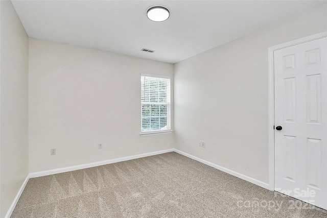 720 Reigate Rd, Charlotte, NC 28262 - unfurnished room with carpet and baseboards