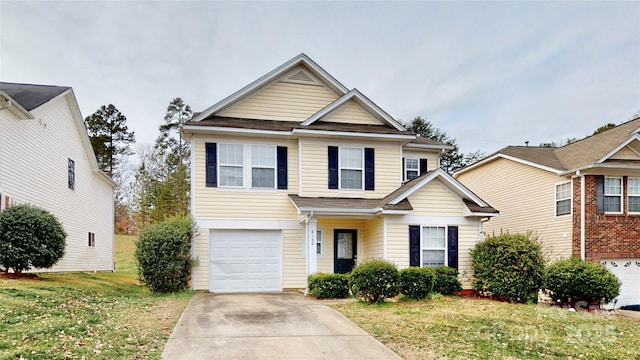 8139 Deodora Cedar Ln, Charlotte, NC 28215 - traditional-style home with a garage, driveway, and a front yard