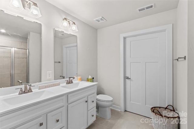124 Kristin View Ln Unit C, Troutman, NC 28166 - full bath featuring double vanity, a stall shower, toilet, and tile patterned flooring