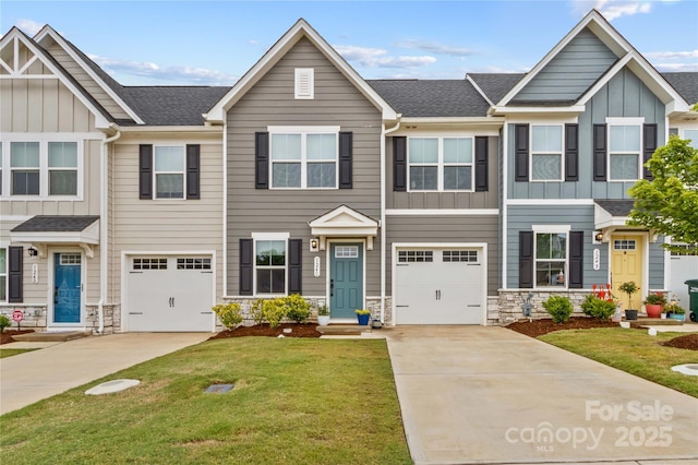 124 Kristin View Ln Unit C, Troutman, NC 28166 - view of property featuring driveway, board and batten siding, and stone siding