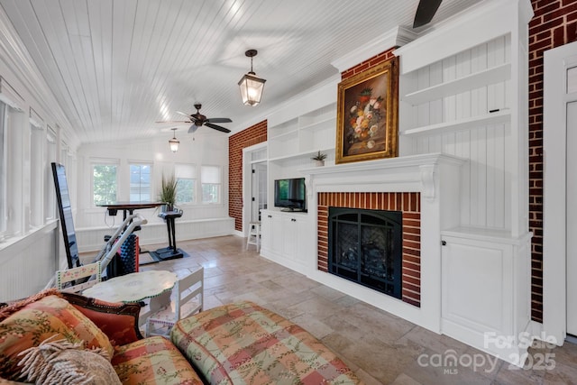 361 5th St NW, Hickory, NC 28601 - living room with a fireplace, ceiling fan, stone tile floors, and lofted ceiling