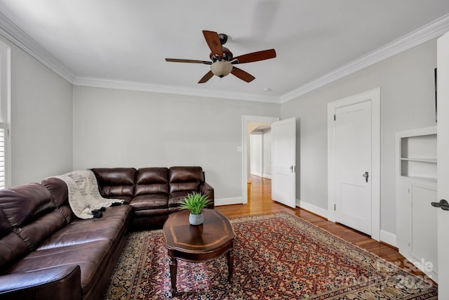 361 5th St NW, Hickory, NC 28601 - living room with ornamental molding, wood finished floors, ceiling fan, and baseboards