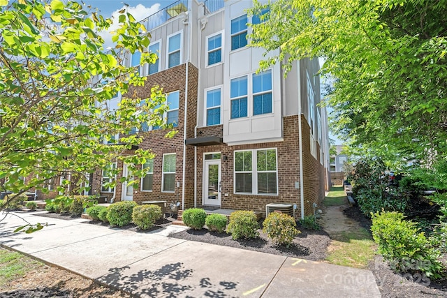 420 E 16th St, Charlotte, NC 28206 - view of front of home with brick siding and central AC unit