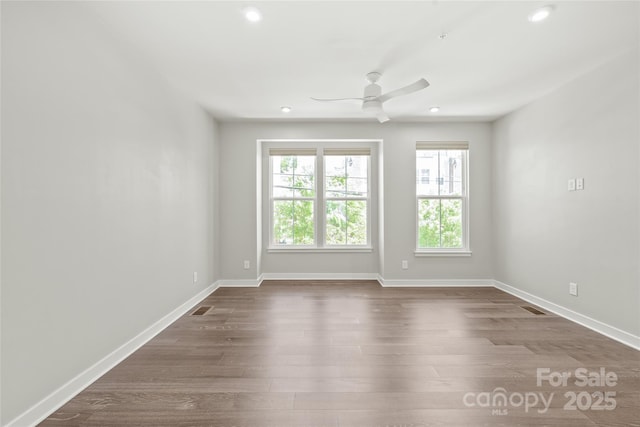 420 E 16th St, Charlotte, NC 28206 - empty room featuring plenty of natural light, ceiling fan, dark wood finished floors, recessed lighting, and baseboards
