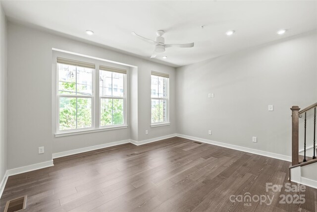 420 E 16th St, Charlotte, NC 28206 - empty room with ceiling fan, stairs, dark wood-style floors, baseboards, and recessed lighting