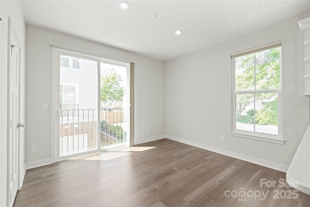 420 E 16th St, Charlotte, NC 28206 - spare room with wood finished floors, baseboards, and recessed lighting