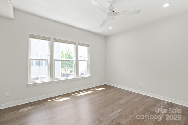 420 E 16th St, Charlotte, NC 28206 - empty room with wood finished floors, baseboards, recessed lighting, and a ceiling fan