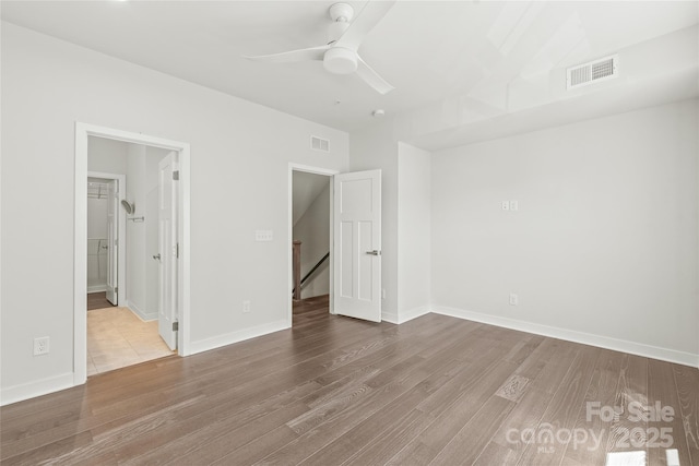 420 E 16th St, Charlotte, NC 28206 - empty room featuring a ceiling fan, wood finished floors, and baseboards