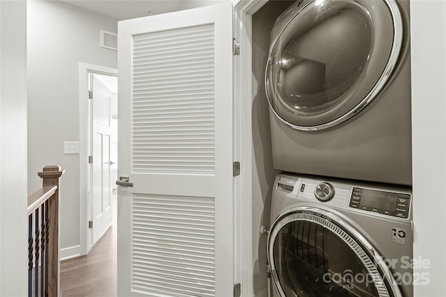 420 E 16th St, Charlotte, NC 28206 - laundry area with stacked washer / drying machine and wood finished floors