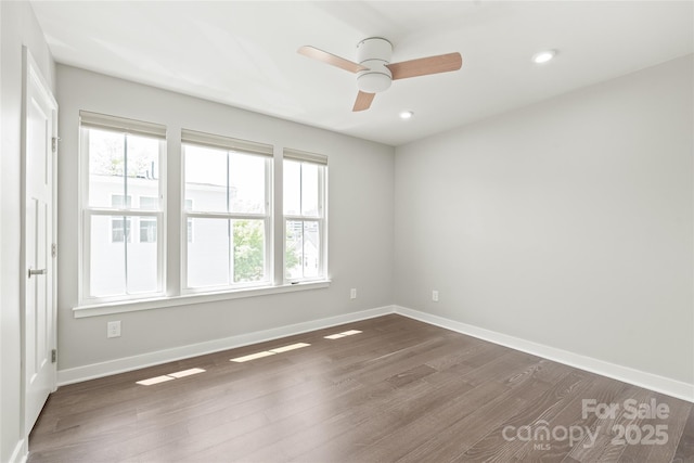 420 E 16th St, Charlotte, NC 28206 - spare room with dark wood-type flooring, ceiling fan, baseboards, and recessed lighting