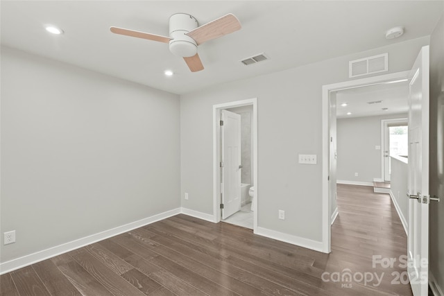420 E 16th St, Charlotte, NC 28206 - unfurnished bedroom featuring dark wood finished floors, recessed lighting, baseboards, and connected bathroom