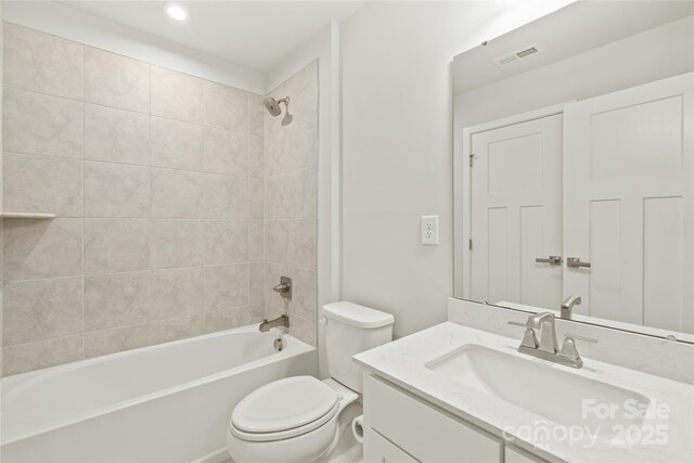 420 E 16th St, Charlotte, NC 28206 - bathroom featuring toilet, vanity, tub / shower combination, and recessed lighting