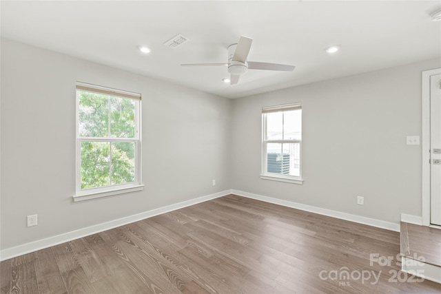 420 E 16th St, Charlotte, NC 28206 - unfurnished room with wood finished floors, ceiling fan, baseboards, and recessed lighting
