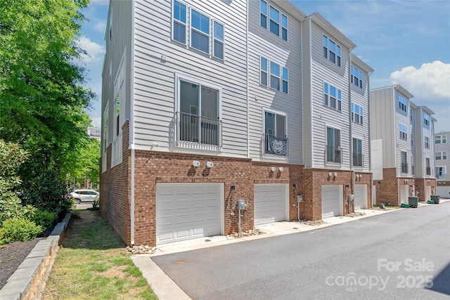 420 E 16th St, Charlotte, NC 28206 - view of property featuring a garage and a residential view