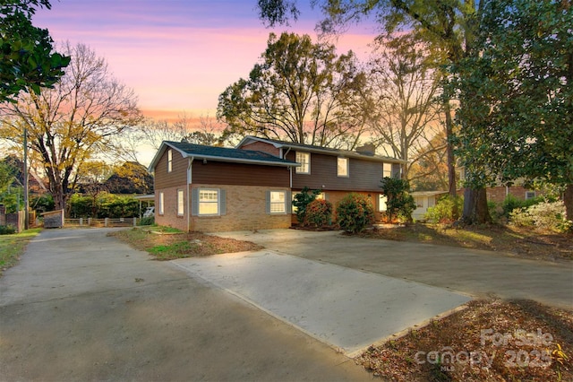 841 12th Ave NW, Hickory, NC 28601 - view of front facade with driveway and brick siding