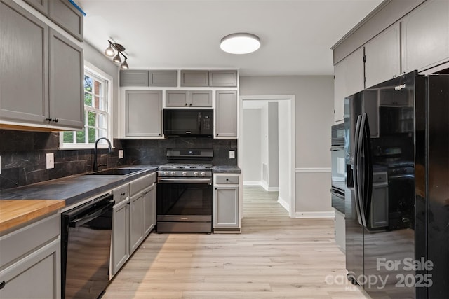 841 12th Ave NW, Hickory, NC 28601 - kitchen featuring black appliances, gray cabinets, and a sink