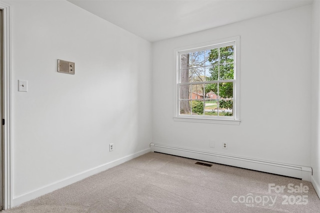 841 12th Ave NW, Hickory, NC 28601 - empty room featuring carpet floors, baseboard heating, and baseboards