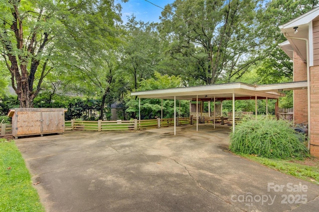 841 12th Ave NW, Hickory, NC 28601 - view of vehicle parking with concrete driveway and a carport