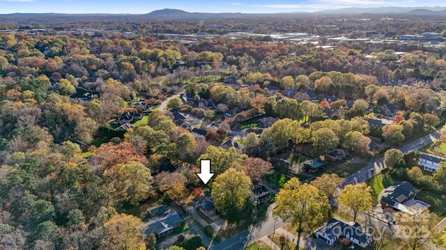 841 12th Ave NW, Hickory, NC 28601 - aerial view of property and surrounding area with a heavily wooded area and a mountainous background