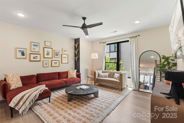 4520 Radler Ct, Charlotte, NC 28217 - living room with wood finished floors, ceiling fan, and recessed lighting