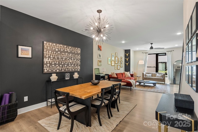 4520 Radler Ct, Charlotte, NC 28217 - dining area featuring a chandelier, recessed lighting, wood finished floors, and ceiling fan