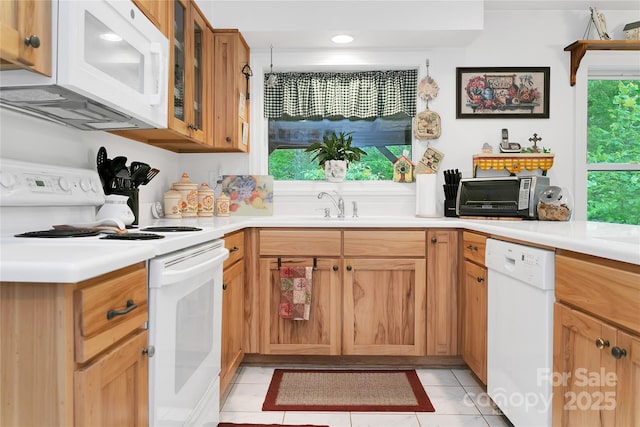 229 Hubbard Hollow Rd, Rosman, NC 28772 - kitchen featuring white appliances, glass insert cabinets, light countertops, and light tile patterned floors