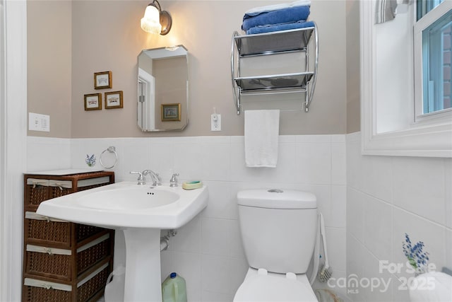 229 Hubbard Hollow Rd, Rosman, NC 28772 - bathroom featuring a wainscoted wall and tile walls