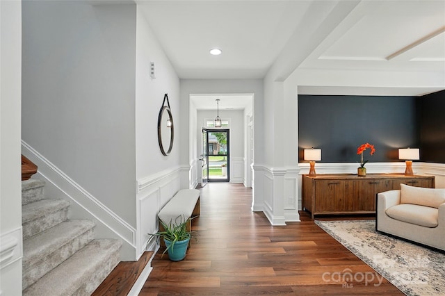 7322 Vesper Dr, Huntersville, NC 28078 - foyer entrance featuring dark wood finished floors, wainscoting, stairs, and recessed lighting