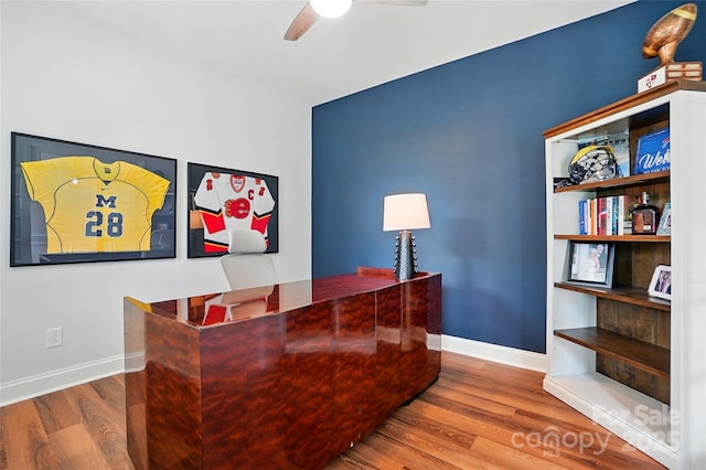 7322 Vesper Dr, Huntersville, NC 28078 - office area featuring wood finished floors and a ceiling fan