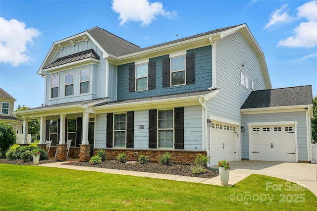 7322 Vesper Dr, Huntersville, NC 28078 - craftsman house featuring a front yard, driveway, roof with shingles, a porch, and stone siding