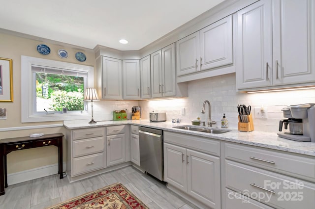 195 Fairway Ln, Blowing Rock, NC 28605 - kitchen with a sink, stainless steel dishwasher, tasteful backsplash, and light stone counters