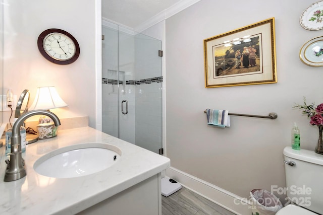 195 Fairway Ln, Blowing Rock, NC 28605 - full bathroom featuring ornamental molding, vanity, toilet, a stall shower, and baseboards