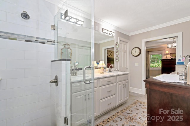 195 Fairway Ln, Blowing Rock, NC 28605 - bathroom featuring a stall shower, double vanity, crown molding, and baseboards