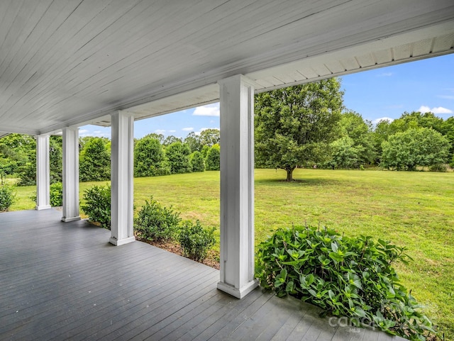 226 Dobbins Rd, Ellenboro, NC 28040 - porch with a lawn and view of wooded area