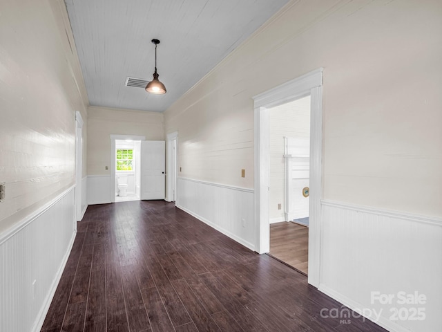 226 Dobbins Rd, Ellenboro, NC 28040 - foyer featuring a wainscoted wall, wood finished floors, and ornamental molding